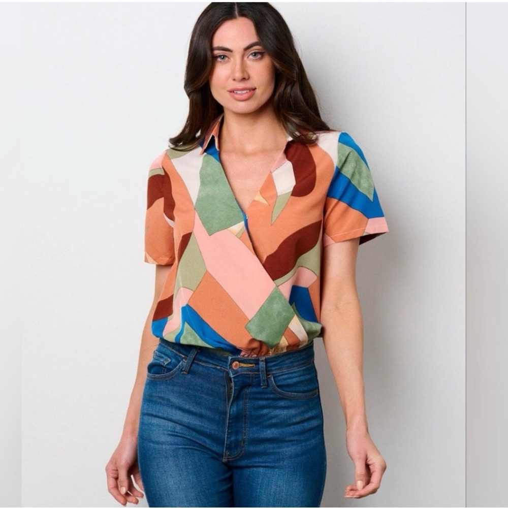 NWT Color Block Bodysuit. Gorgeous Colors. Flattering Size Large (runs small)